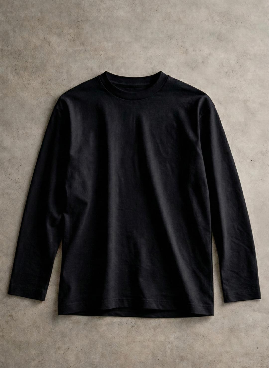Black long-sleeve shirt on a textured beige background