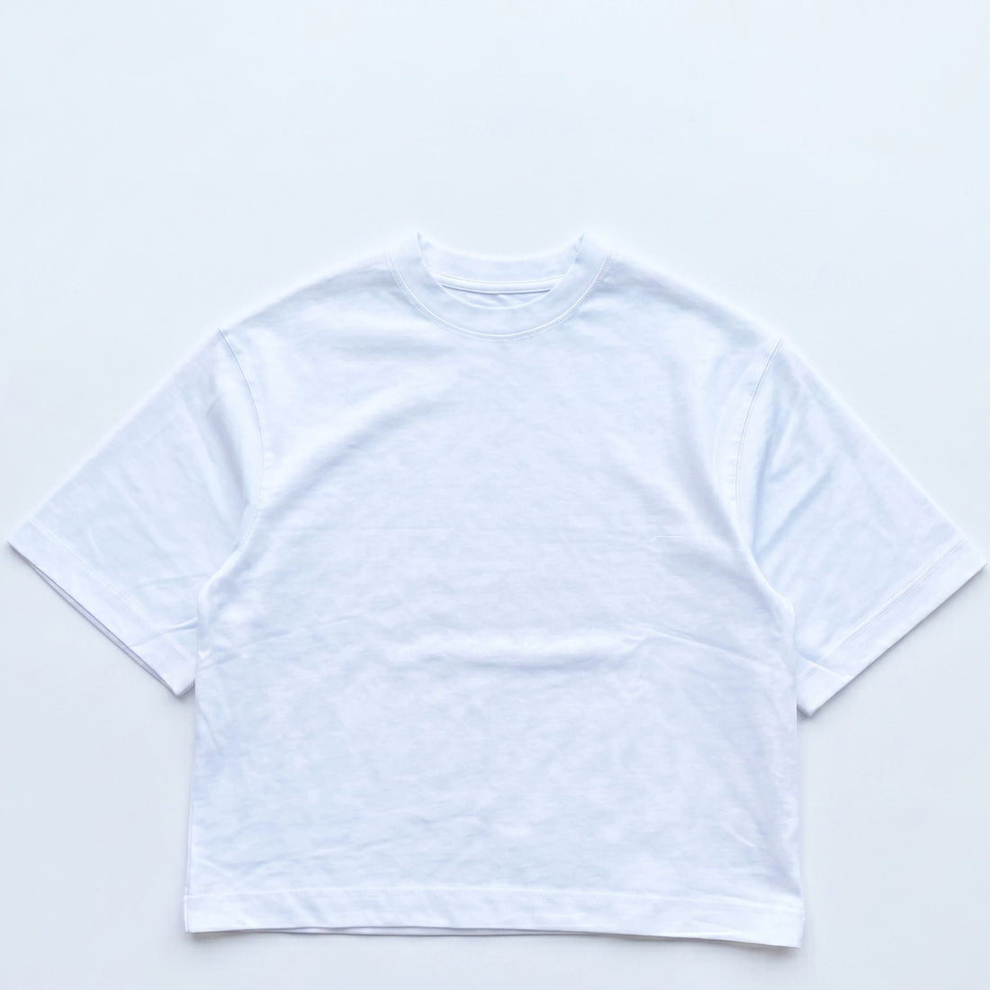 White heavyweight boxy cropped blank t-shirt with a square structured fit, wholesale blank apparel for UK streetwear brands and print shops