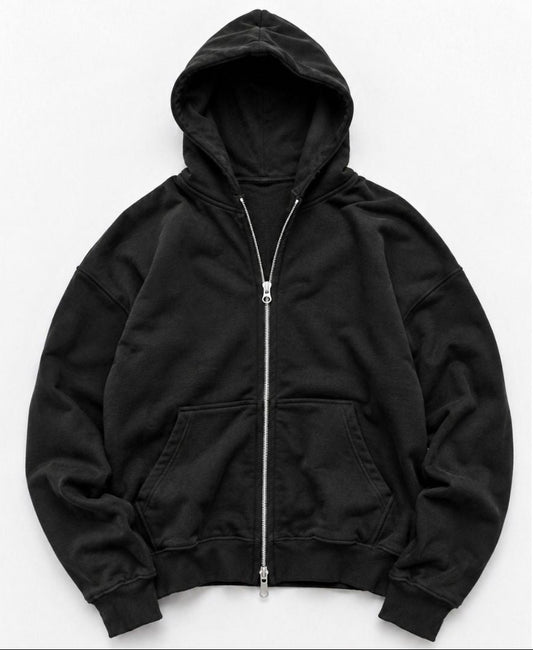 A black zip-up hoodie with a silver zipper, laid flat against a light gray background.