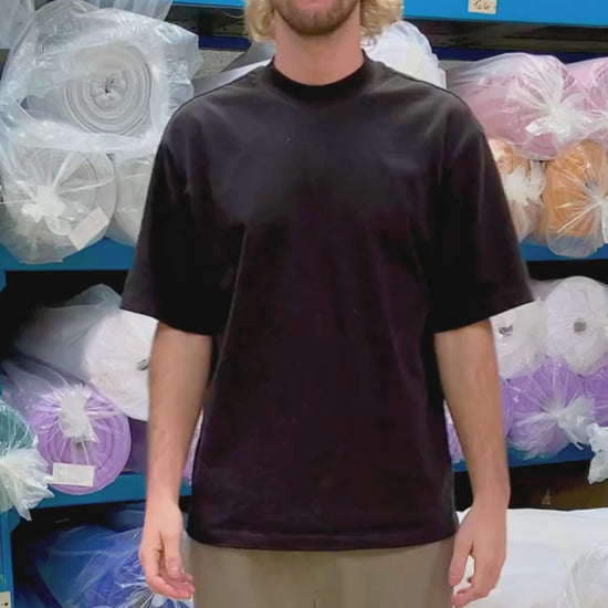 Blank T-shirt in a video of a man showing the size and colour